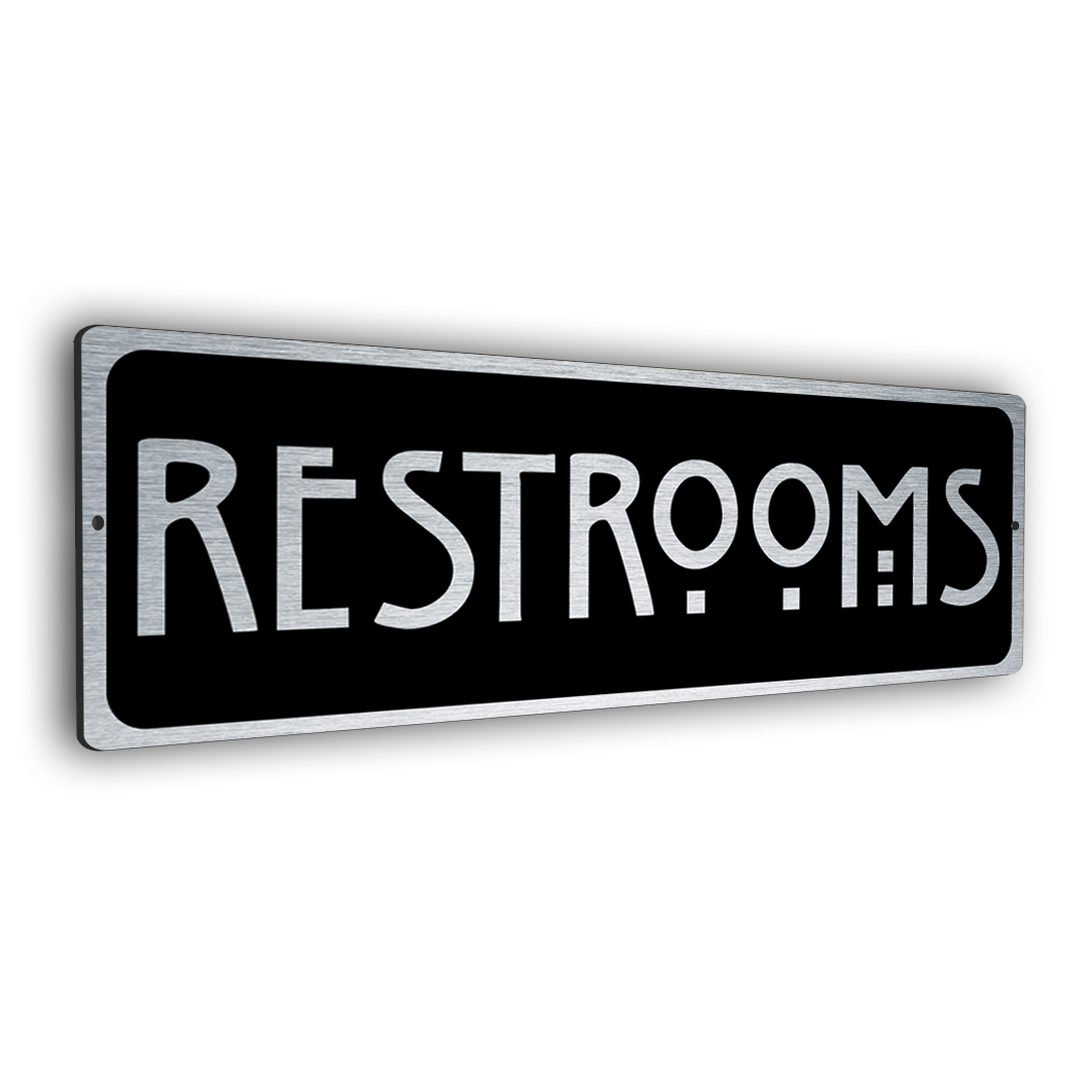 brushed silver restrooms sign